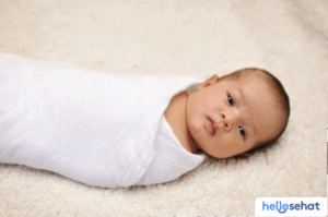 Rahasia Bedong Bayi: Manfaat Ajaib & Cara Praktisnya
